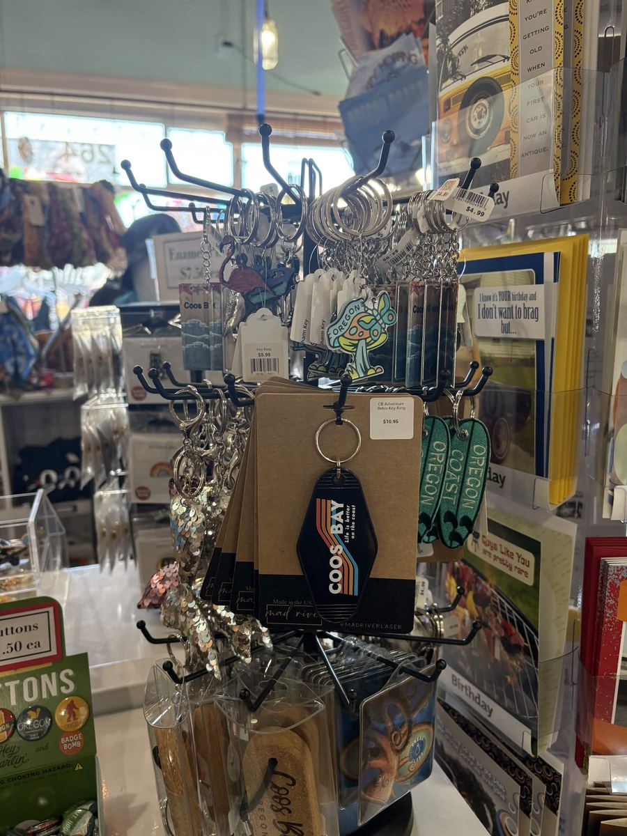 Spinner rack of Coos Bay and Oregon Coast souvenir keychains